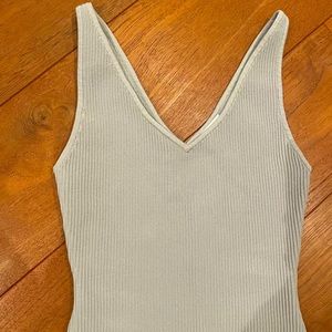 Aritzia Babaton Sculpt Knit Double V neck Tank in very light/powder blue.